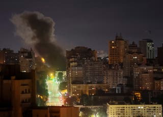 Smoke rises in the city after a Russian drone strike on Kyiv amid Russia's attack on Ukraine